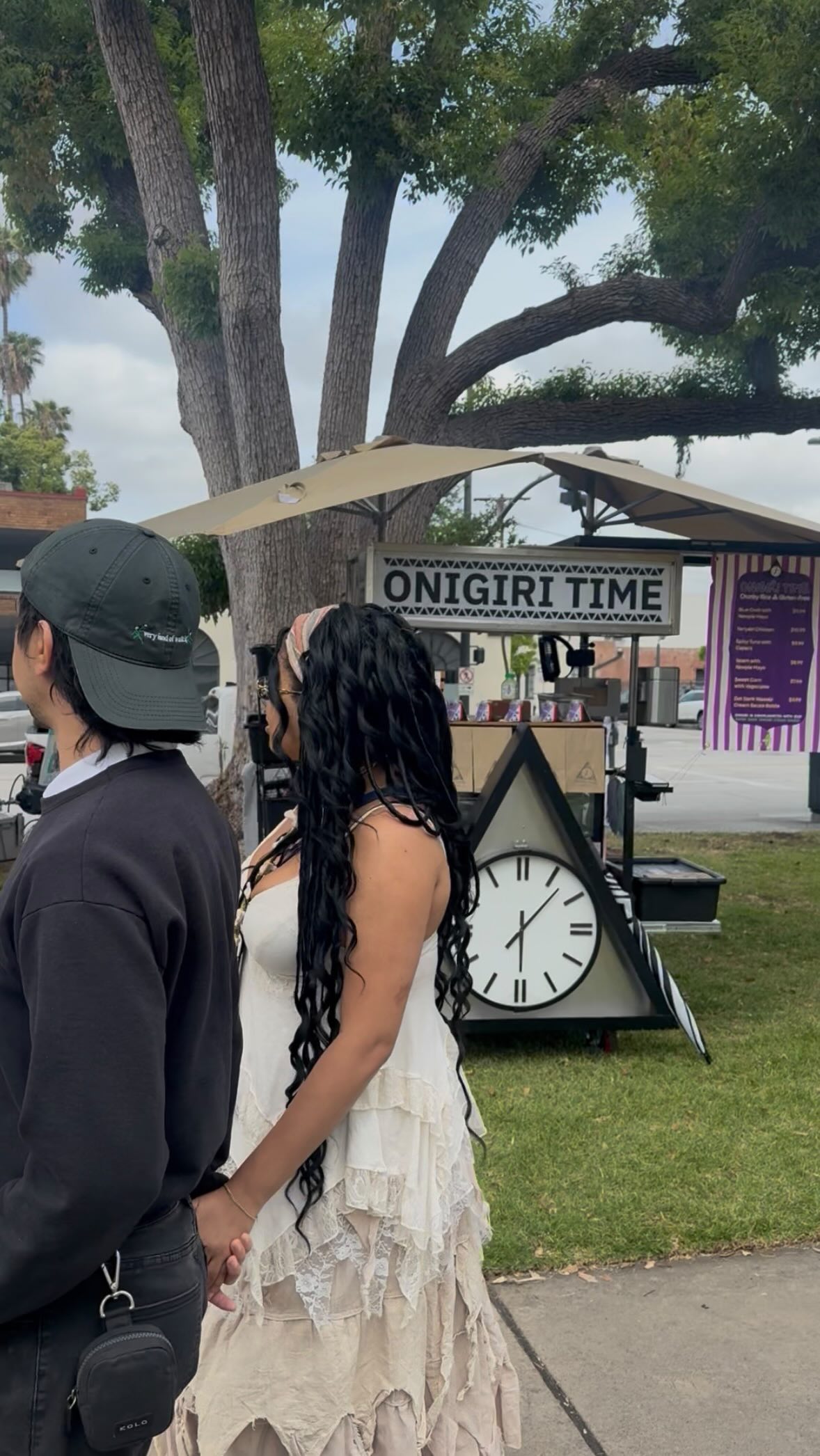 Customer review — couple visiting the Onigiri Time cart in Pasadena