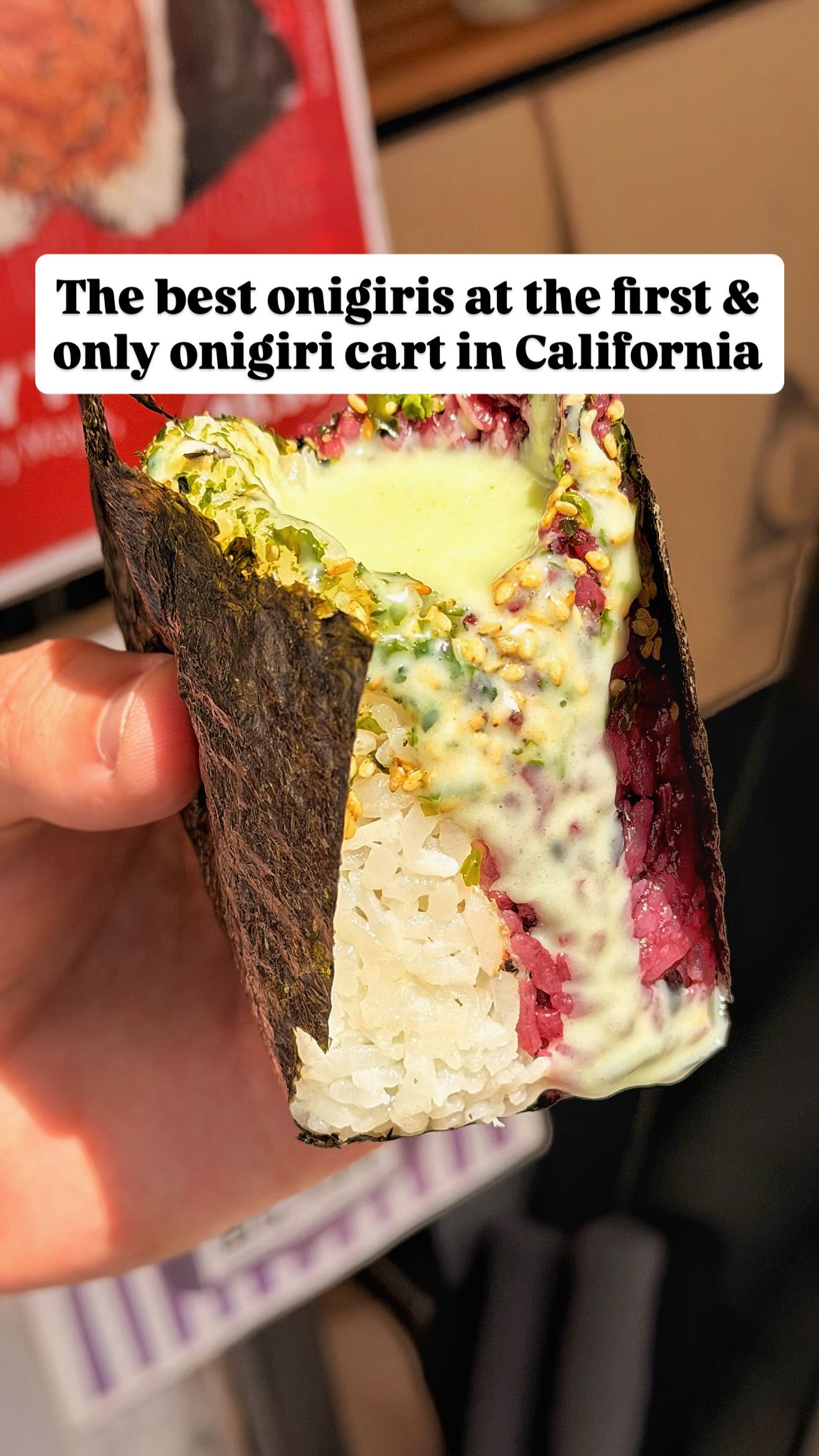 Customer review — open-faced onigiri with the headline 'The best onigiris at the first & only onigiri cart in California'